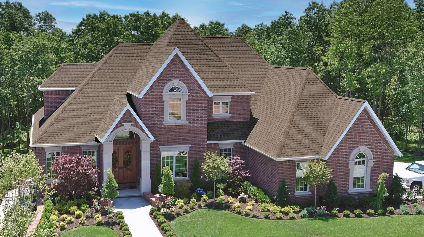 Home roofed with TAMKO Heritage laminated asphalt shingles, from TAMKO's official Heritage product page