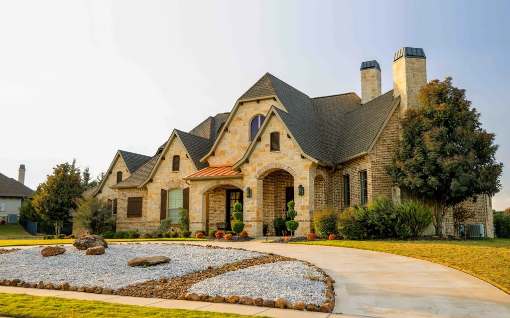 Home roofed with TAMKO StormFighter FLEX impact-rated shingles, from TAMKO's official shingle lineup page