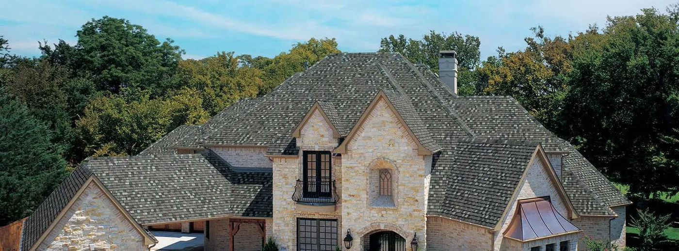 TAMKO Titan XT shingles shown on a house in TAMKO's official Titan XT product photography